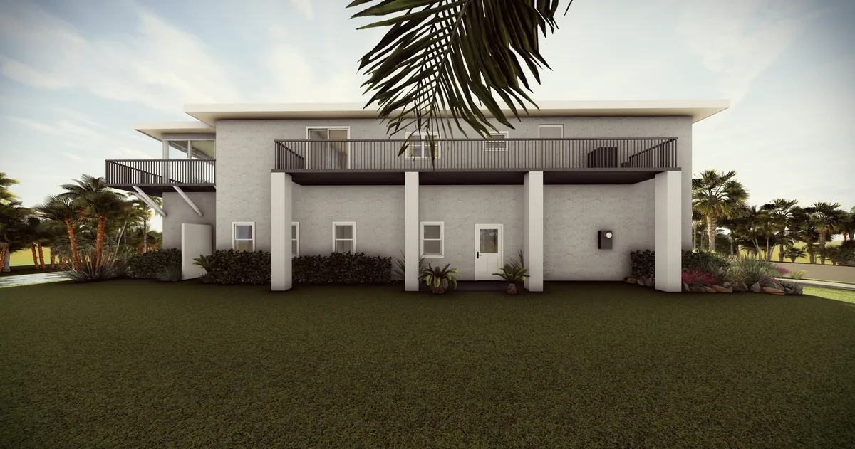 Side view of elevated home with balcony